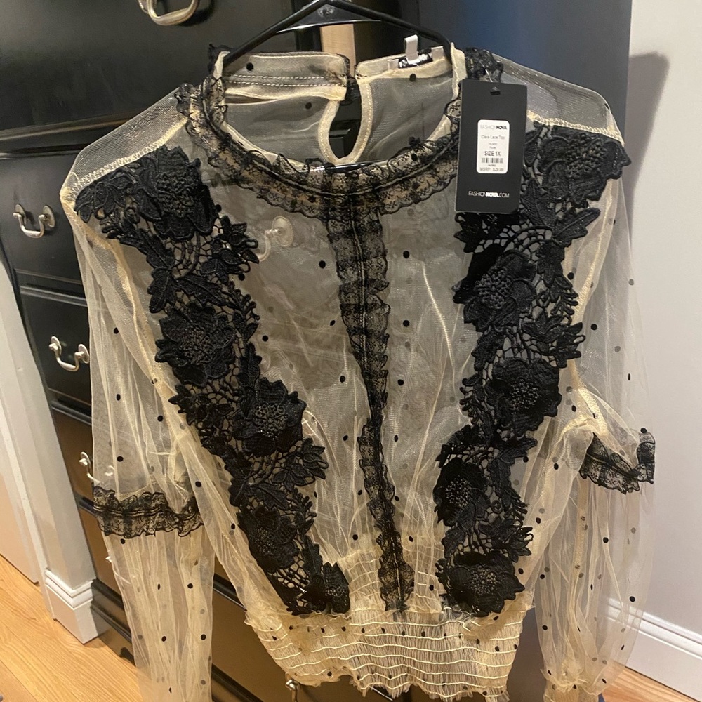 Fashionova NWT beige/black sheer blouse.